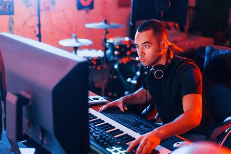 how much does music producers make and do they have to be good at playing an instrument?